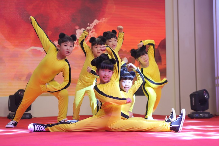 The launch event starting with a show performed by cute “Kung Fu kids”  